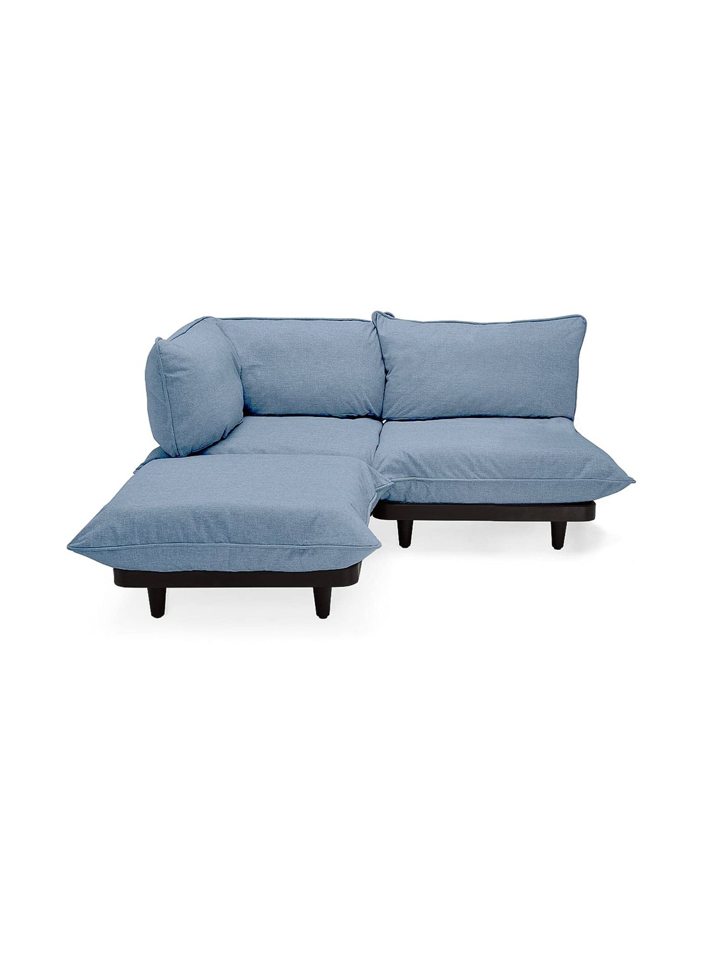 Paletti de Fatboy : un sofa sectionnel d’extérieur, résistant à l'eau et aux UV, conçu pour enrichir votre jardin avec style et confort. Bleu orage.