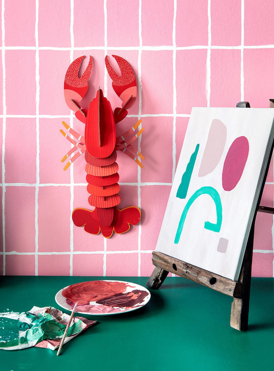 Le Homard de Studio Roof : une décoration marine en 3D, alliant durabilité et design artistique dans un style contemporain.