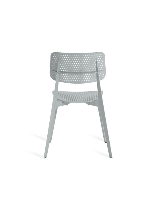 Chaise Stellar TOOU : une pièce design et pratique, avec un contraste parfait entre lignes fortes et assise ergonomique. gris.