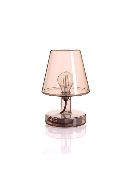 Fatboy Transloetje, la lampe de table qui illumine vos soirées. Rechargeable, sans fil, et adaptée à tout environnement. Une déco scintillante et colorée ! Brun.