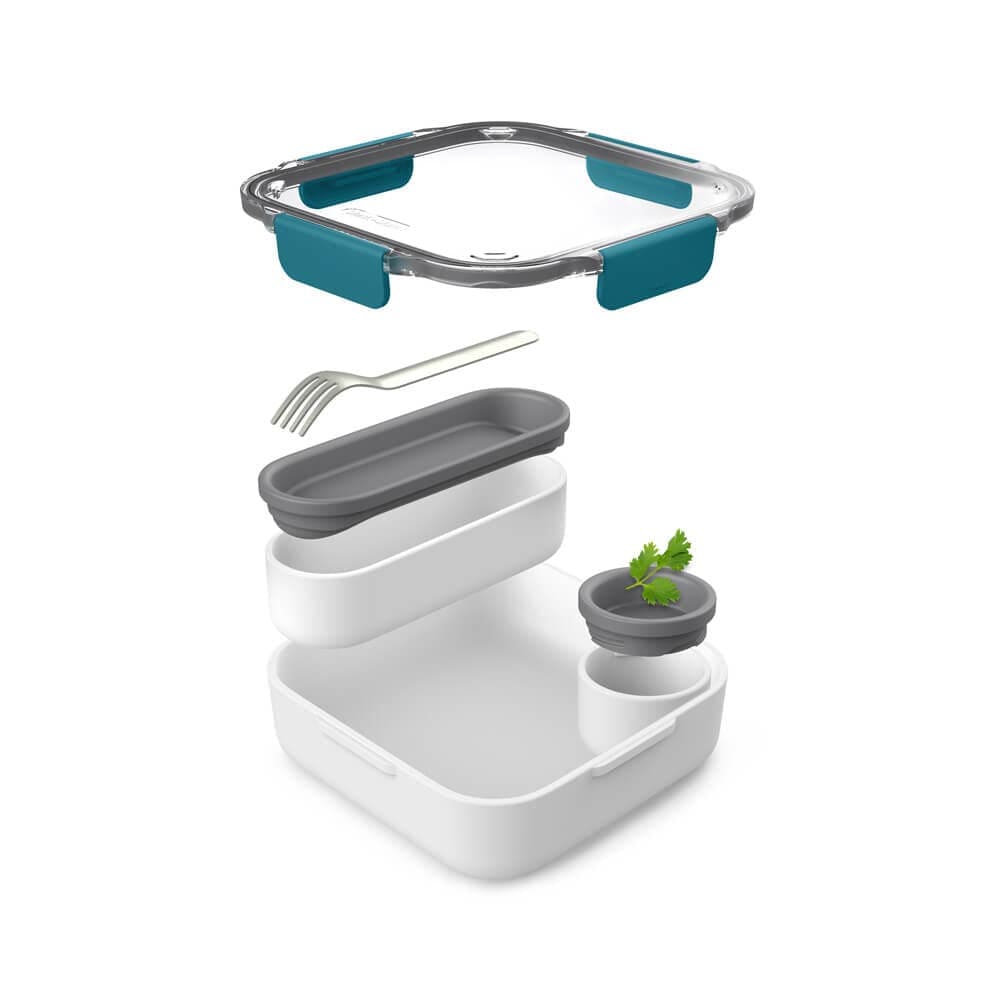 Boîte à lunch innovante Black+Blum : pot à sauce hermétique, compartiment micro-ondable, fourchette en acier. Fraîcheur et praticité pour des déjeuners équilibrés en déplacement.