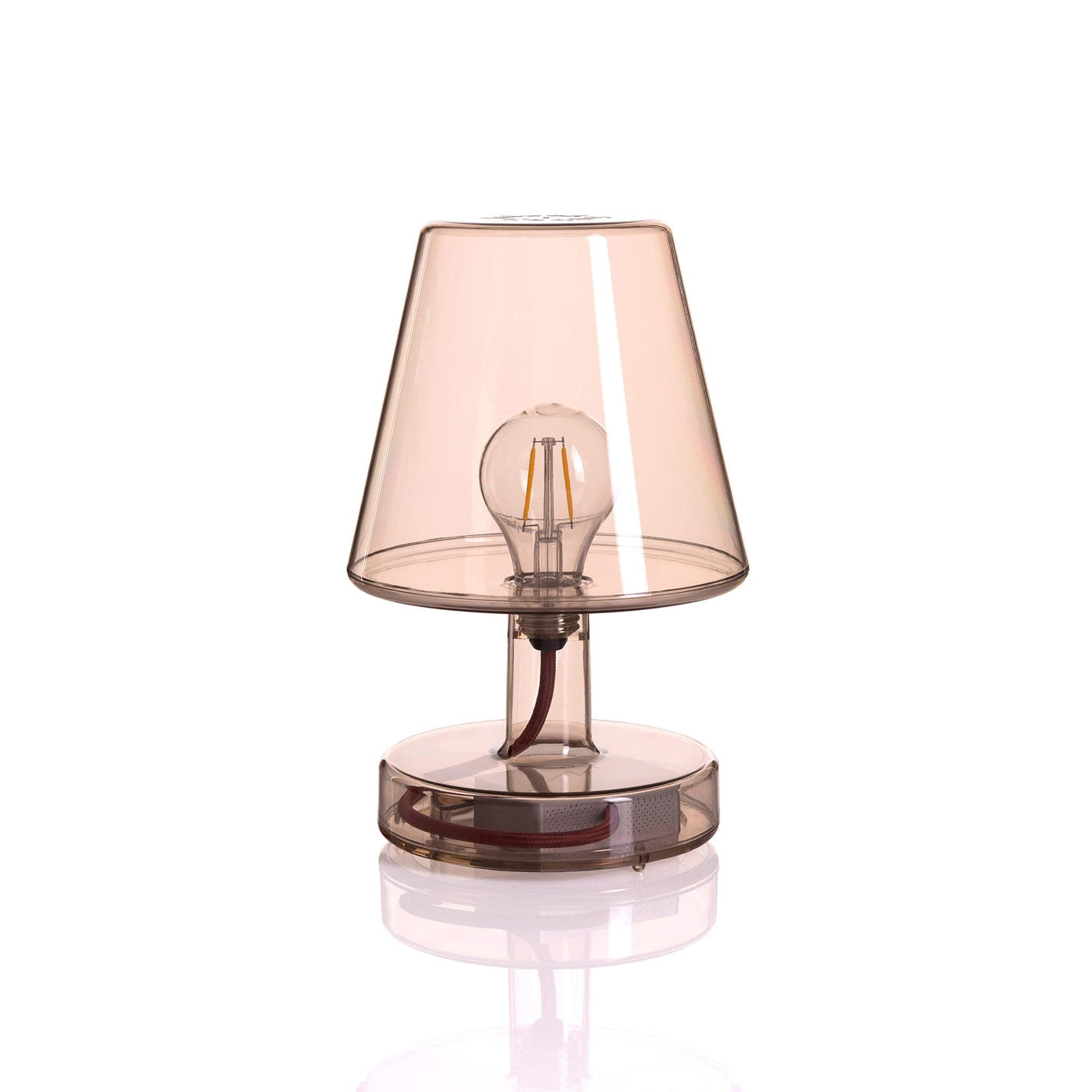 Optez pour la lampe Transloetje de Fatboy pour une touche rétro-moderne. Portable et sans fil, elle offre une lumière DEL à trois intensités, idéale pour intérieur et extérieur. Brun