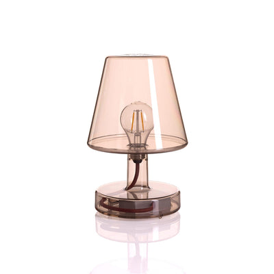Optez pour la lampe Transloetje de Fatboy pour une touche rétro-moderne. Portable et sans fil, elle offre une lumière DEL à trois intensités, idéale pour intérieur et extérieur. Brun
