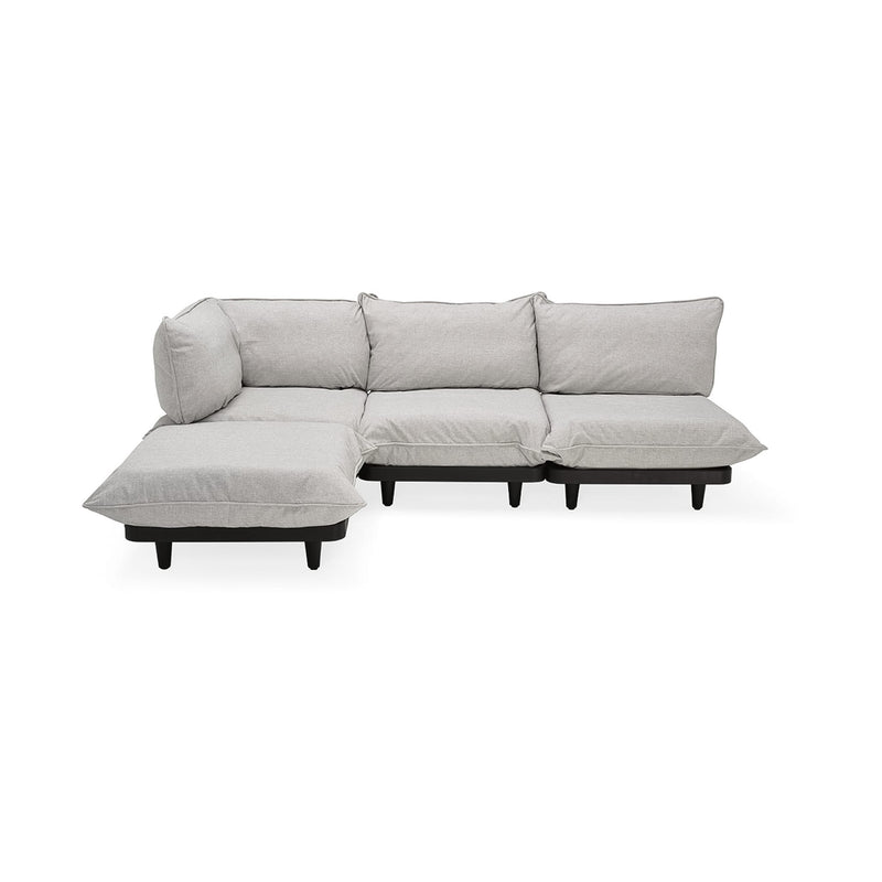 Élevez votre espace extérieur avec le sofa sectionnel 4 places Paletti de Fatboy, alliant praticité et élégance. Brume