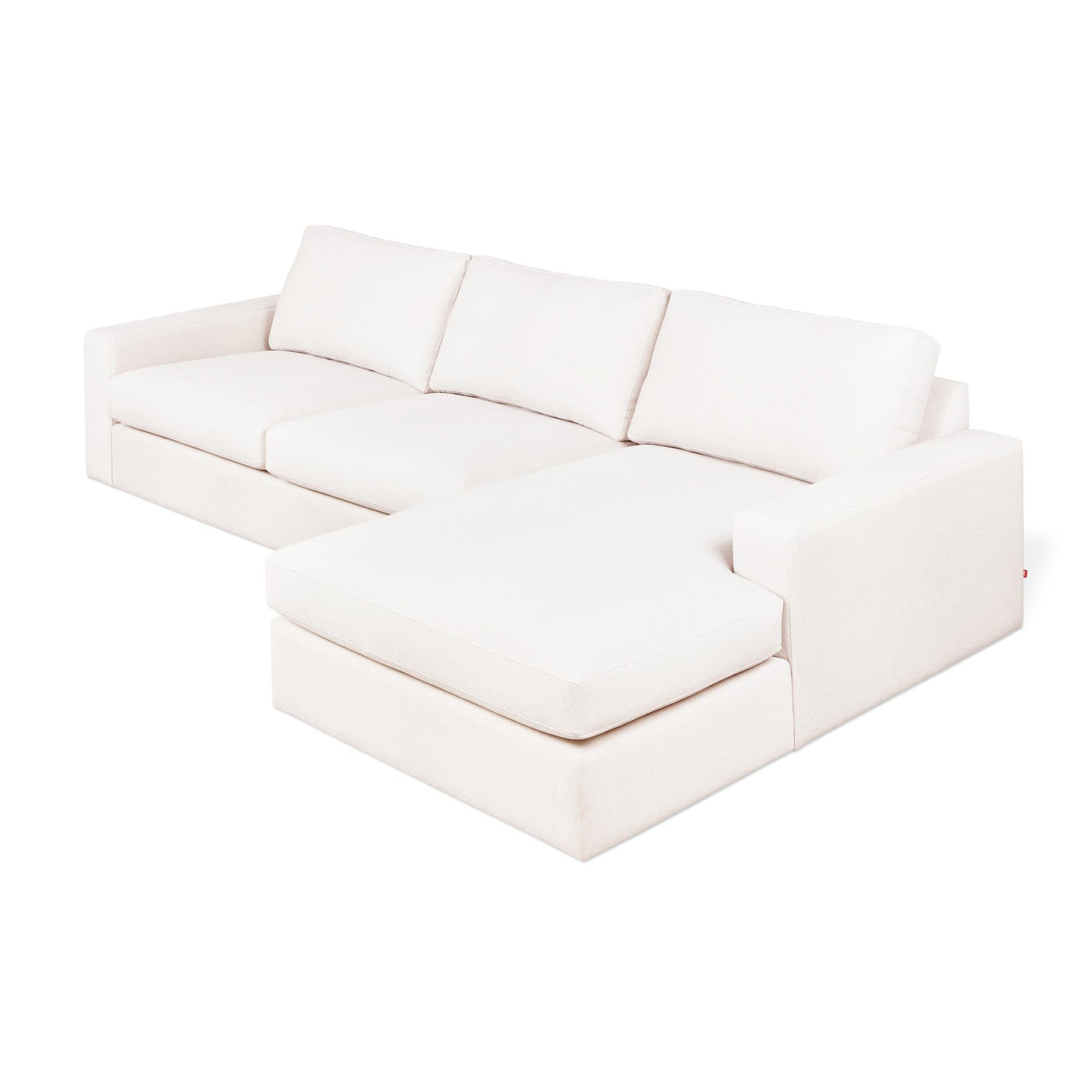 Le sofa sectionnel Ashdale de Gus* Modern, un design fonctionnel et élégant qui s’adapte à toutes les configurations de salon. merino Cream.