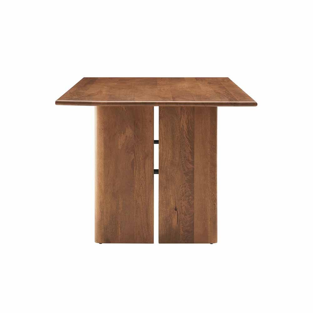 La table à dîner Amistad, bien plus qu'un meuble, une expérience. En bois de manguier, elle offre charme et durabilité. Les patins réglables soulignent l'engagement envers la qualité.