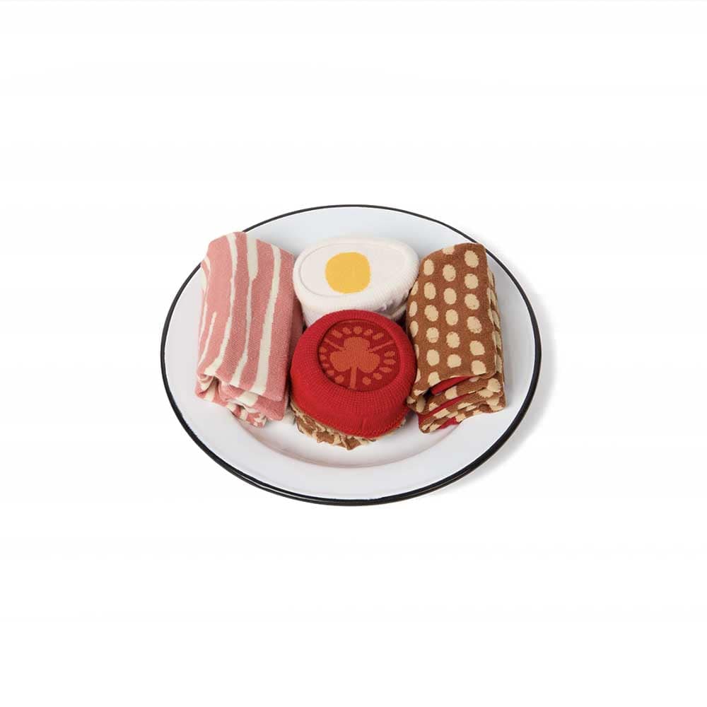 Une illusion de mode qui éveille la curiosité : les bas English Breakfast d'Eat My Socks. Jouez avec la créativité et étonnez votre entourage.