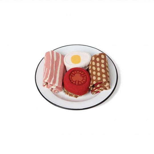 Une illusion de mode qui éveille la curiosité : les bas English Breakfast d'Eat My Socks. Jouez avec la créativité et étonnez votre entourage.